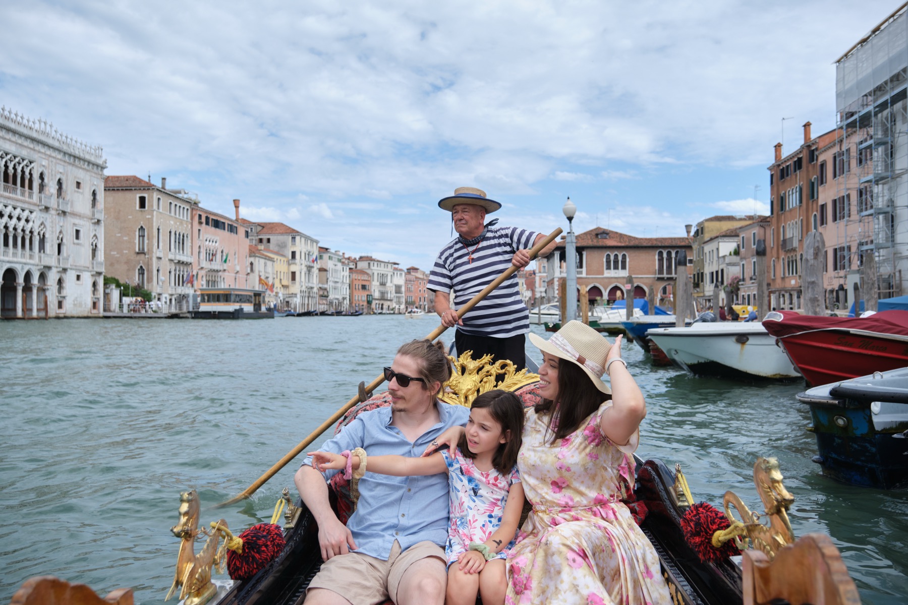 Family gondola ride through Venice
